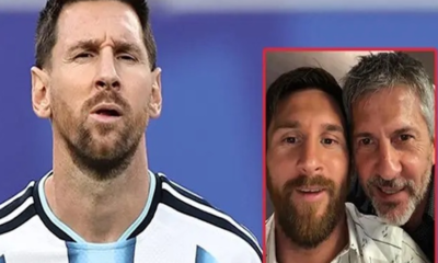 Man in a white and light-blue Argentina soccer jersey faces the camera; a red-framed inset shows two men taking a selfie together beside him.