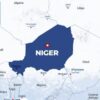 Niger highlighted in dark blue on an Africa map with Niamey marked by a red dot.