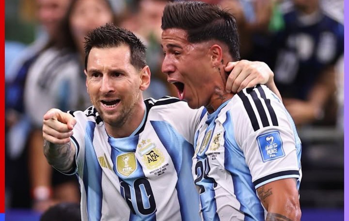 Two Argentine national team players celebrate together, arms around each other, in light-blue and white striped jerseys.