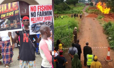 Protesters hold signs reading 'No Fishing, No Farming, No Livelihood' outside a building exterior.