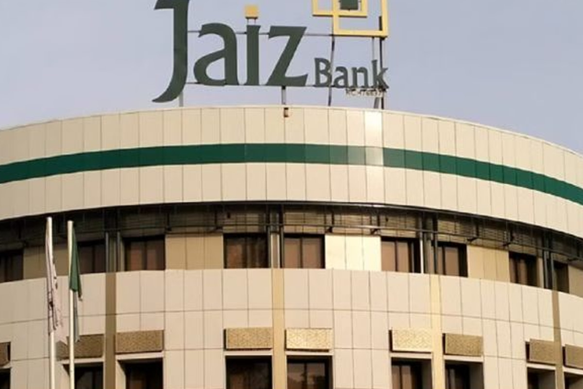 Jaiz Bank signage atop a modern beige building with a green stripe
