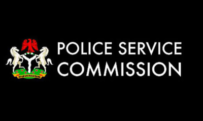 Police Service Commission logo with crest on the left and the text POLICE SERVICE COMMISSION on a black background.”] ,