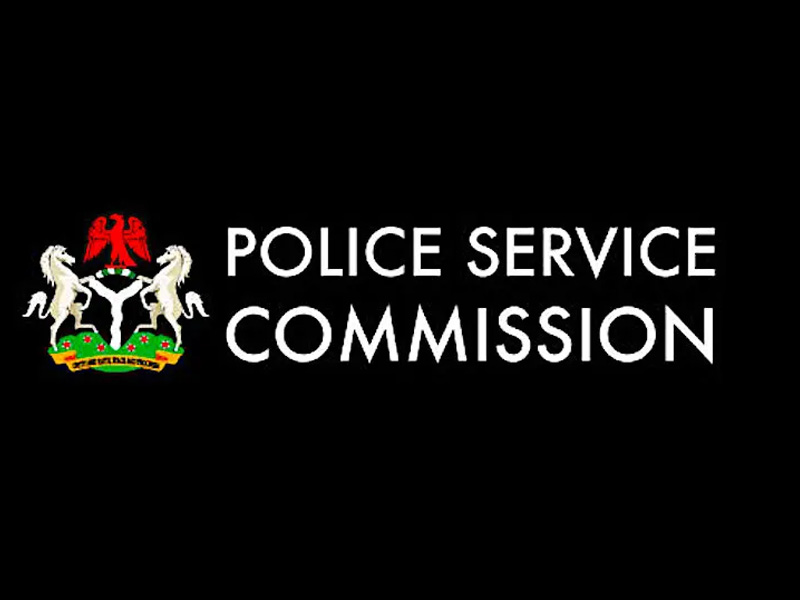 Police Service Commission logo with crest on the left and the text POLICE SERVICE COMMISSION on a black background.”] ,
