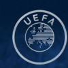 UEFA circular logo on a dark blue background