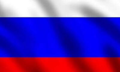 White, blue, and red horizontal flag representing the national flag of Russia (top to bottom).