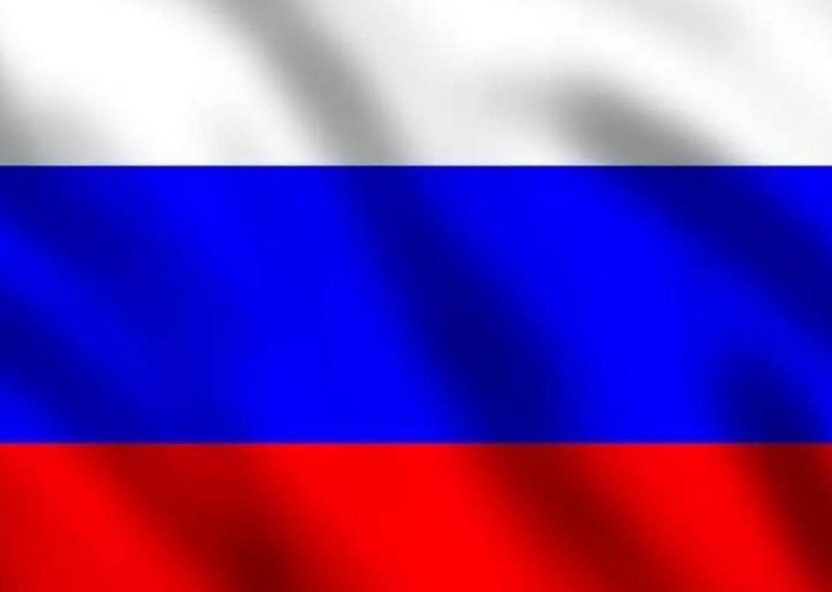White, blue, and red horizontal flag representing the national flag of Russia (top to bottom).