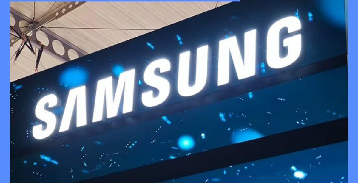 Samsung logo illuminated on a blue trade show banner/booth display at a tech event