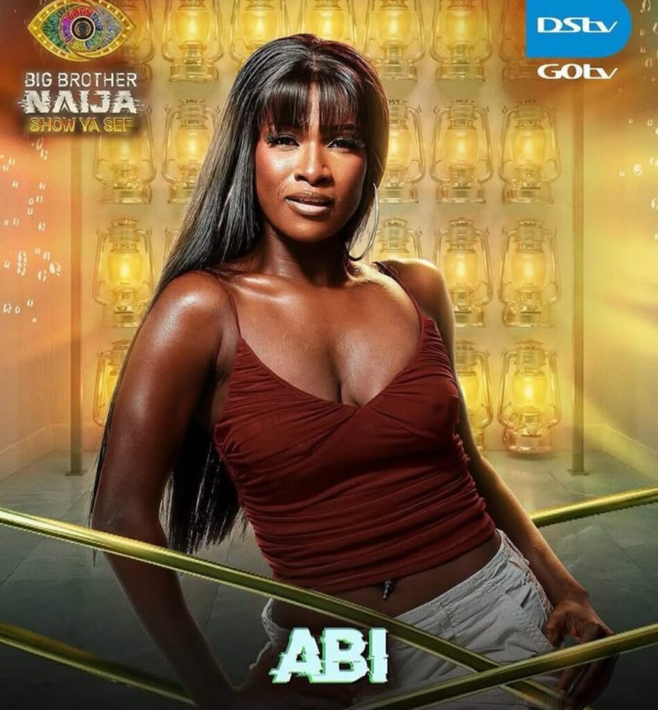 Promotional BBNaija poster featuring a woman in a red top posed in a lantern-lit backdrop.