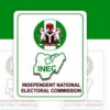 INEC logo: green map outline, crest, and the text ‘Independent National Electoral Commission’ on a white card with green border.”