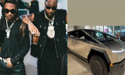 Collage: two men in black outfits and sunglasses posing indoors on the left, with a silver futuristic SUV on display to the right.