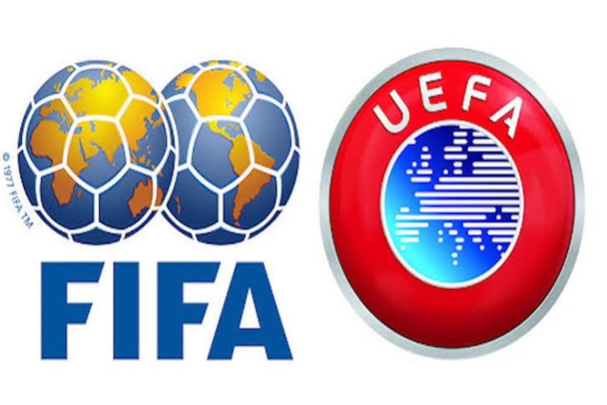 FIFA logo with two globe-shaped soccer balls beside the word FIFA, and the UEFA crest to the right on a white background.