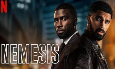 Netflix poster for Nemesis showing two men back-to-back in a city at night without explicit action.