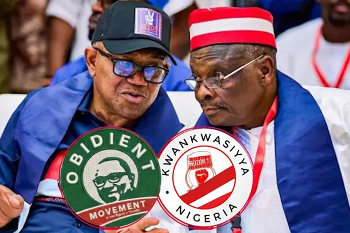 Two men at a political rally wearing round campaign badges for Obidient Movement and Kwankwasiyya Nigeria.
