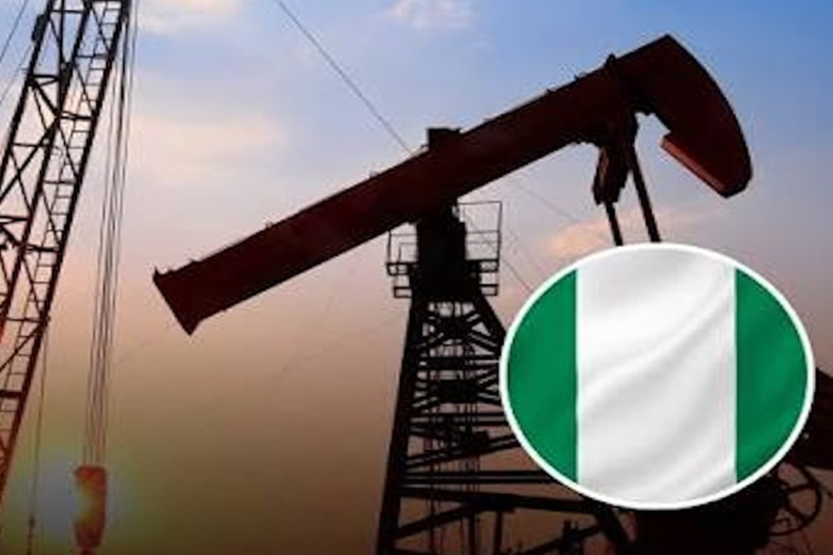 Oil pump jack silhouettes at sunset with a circular Nigerian flag badge in the foreground.