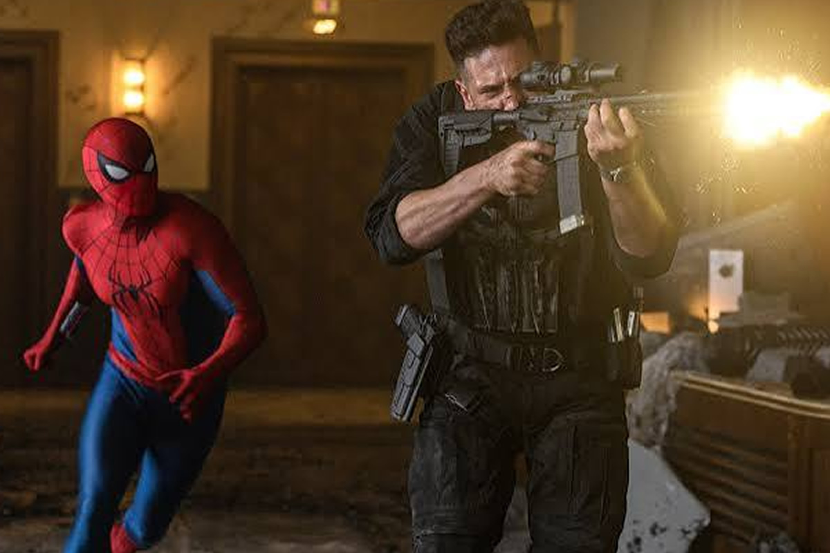Spider-Man runs beside a armed soldier firing a rifle in a dimly lit hallway.
