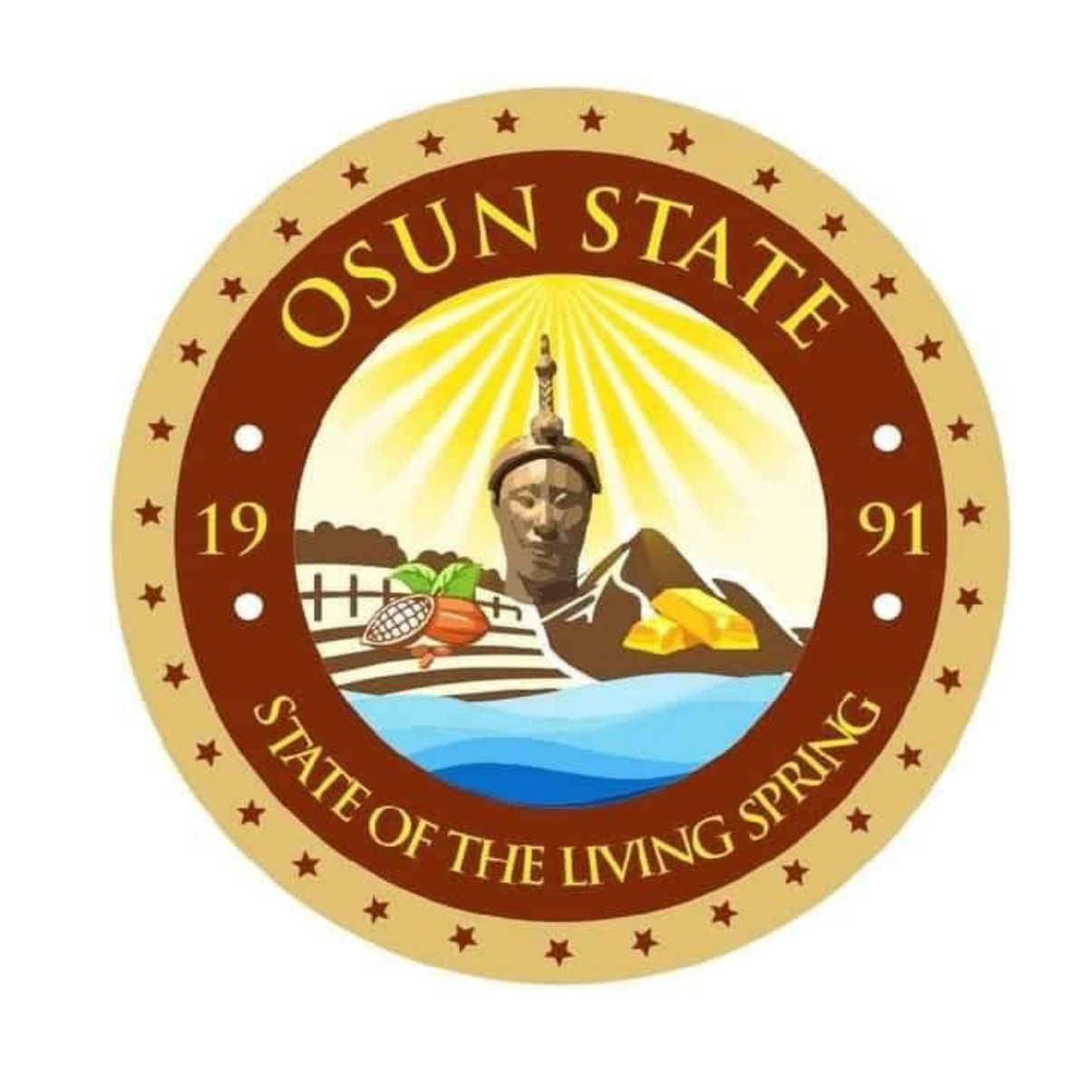 Osun State seal showing a central statue with sun rays, farm fields, a river, and gold, framed by a circular motto, ‘State of the Living Spring’.