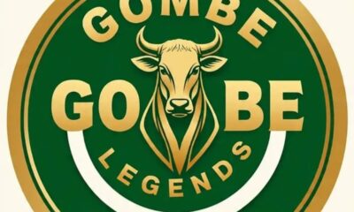 Logo for Gombe Legends: green and gold circular emblem with a stylized bull head in the center and 'GOMBE' above, 'LEGENDS' curved below.