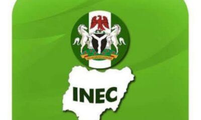 INEC logo on a bright green background, featuring Nigeria's coat of arms above a map silhouette labeled INEC as the emblem of Nigeria's electoral commission.